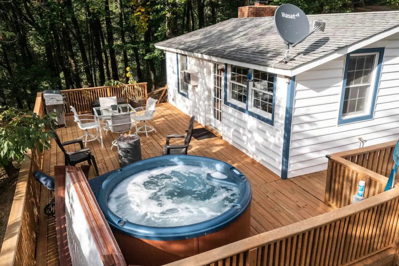 Welcome to the back deck, complete with a hot tub, fire pit, outdoor dining table, and bbq grill. Enjoy views of nature, especially the night sky, with clear views of the Milky Way. Try to visit us during a meteor shower if you can.