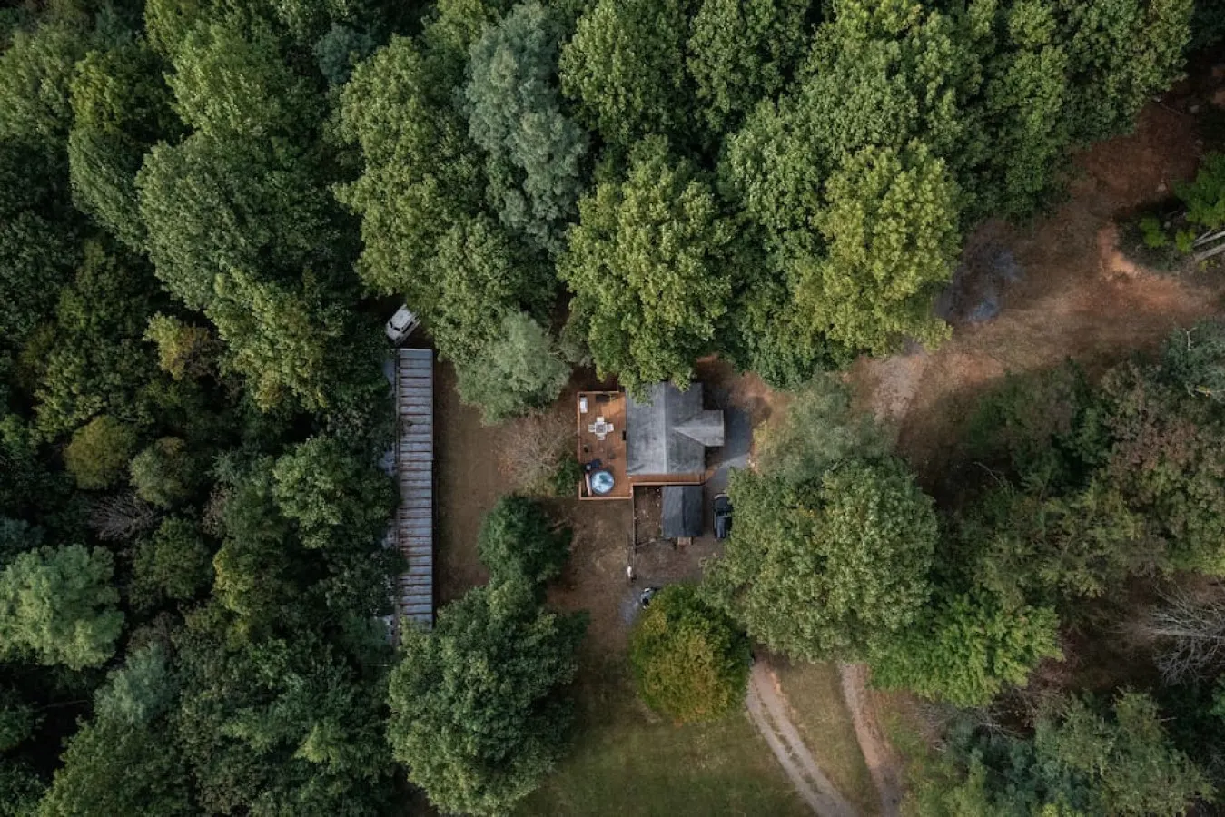 This is an aerial view of our cozy cabin. You really are immersed in the woods, while still being close to town. Pictured is our barn. You can also see Skyline Drive in Shenandoah National Park from our property.