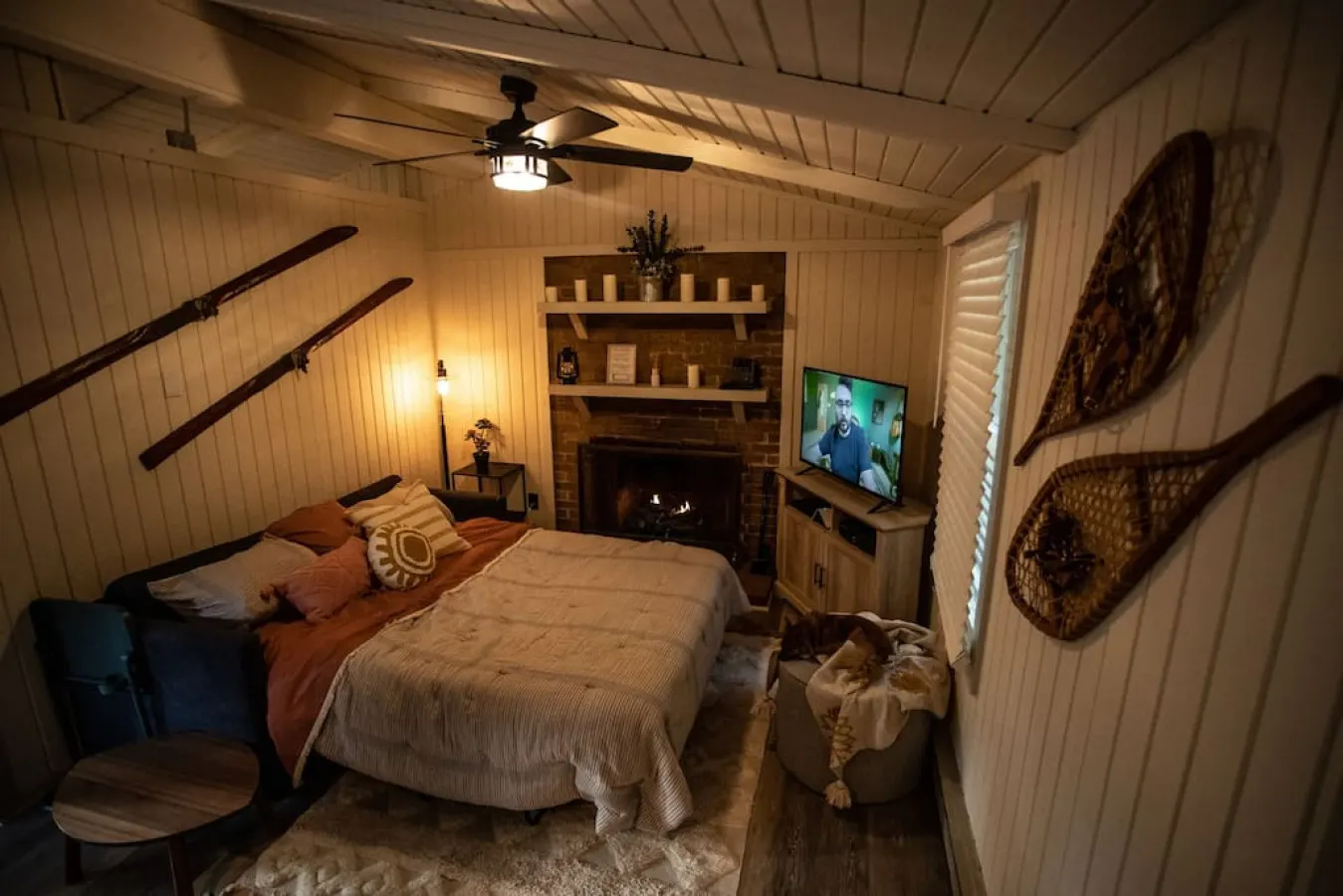 Get extra comfy while binging your favorite TV or movie series - our couch becomes a queen sized bed, right next to the fireplace. 
If you look closely, you'll see my pup. We love pets and hope you bring yours along!