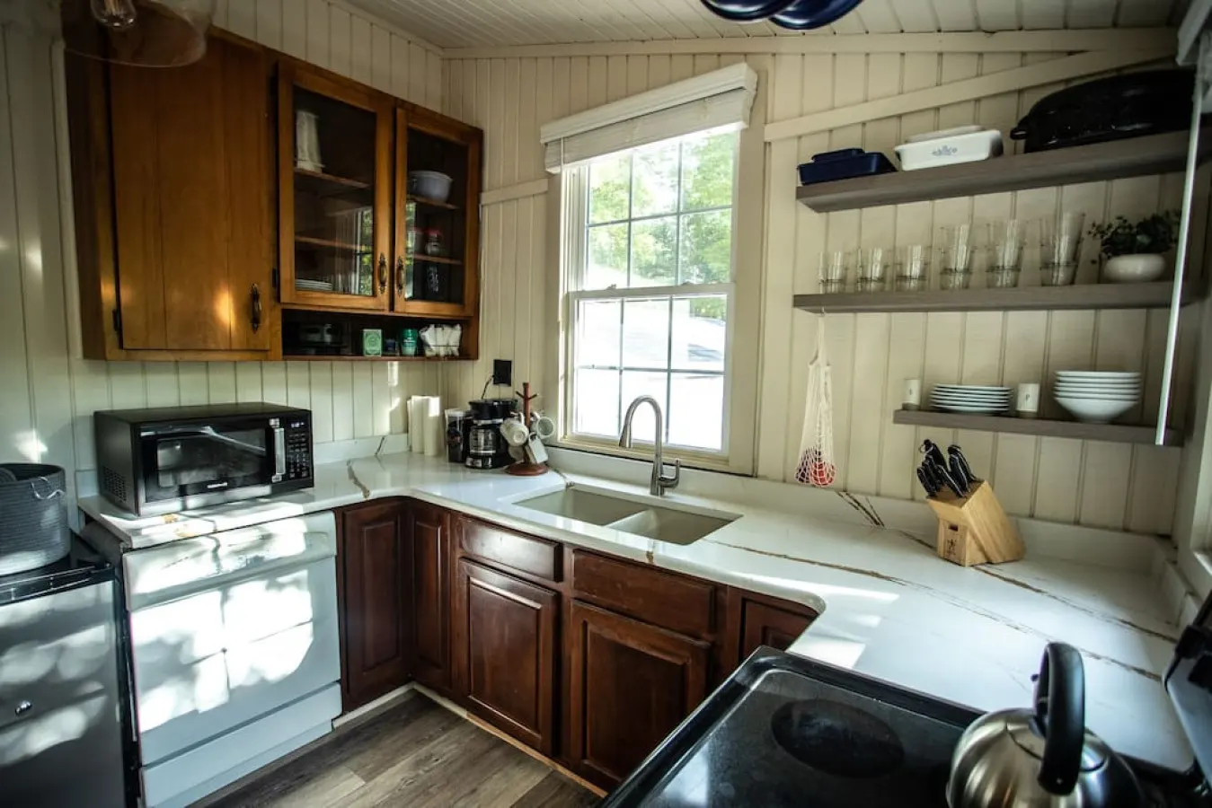 Our kitchen is well-stocked with the tools you need to prepare a meal with someone special. Clean up is easy - we have a dishwasher and a deep, double sink.