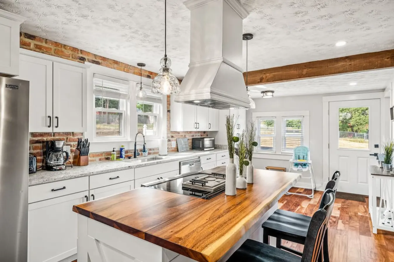 A well stocked kitchen with all new appliances. Open space kitchen area overlooks the living & dining room areas.