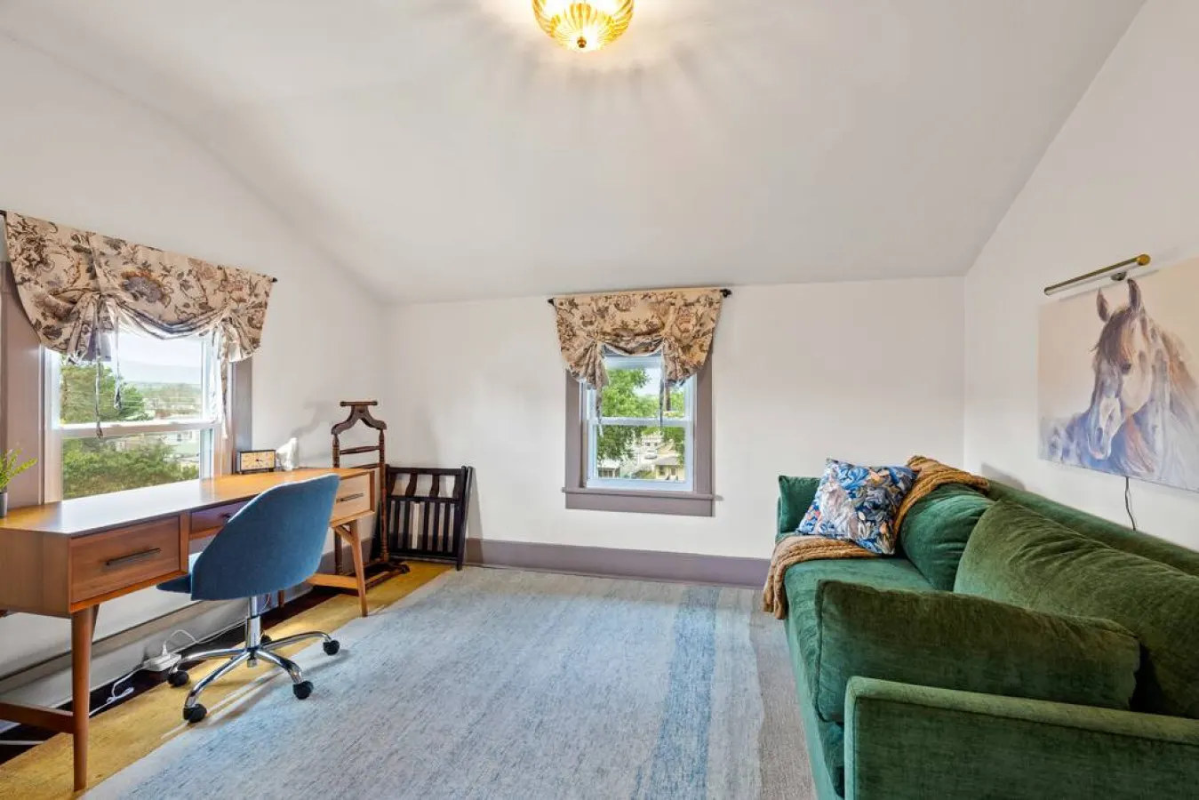 The third bedroom upstairs can be used an office, lounge, or as a bedroom with the pullout couch.