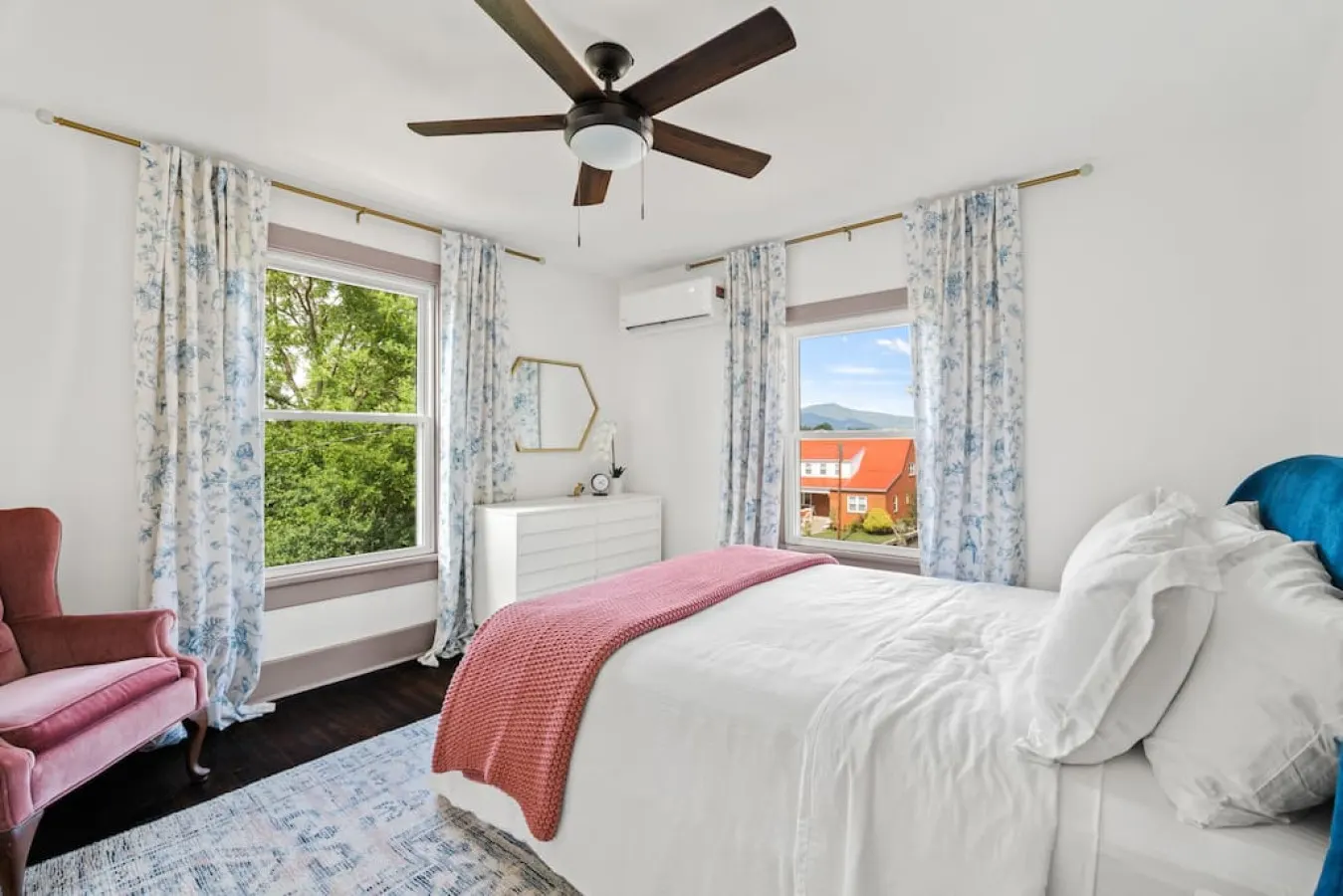 The queen bedroom has mountain views from both windows.