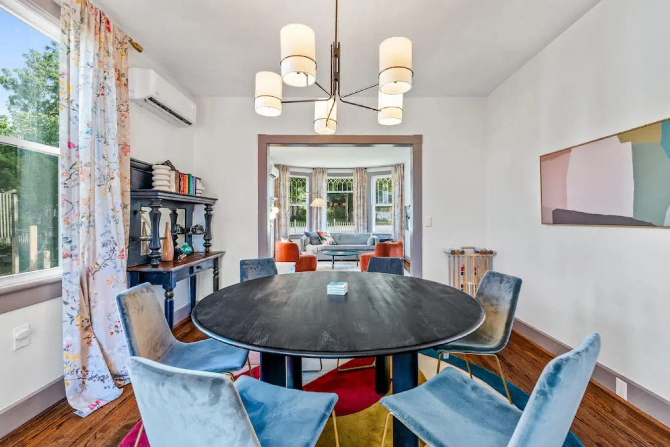 The spacious dining room has seating for six.