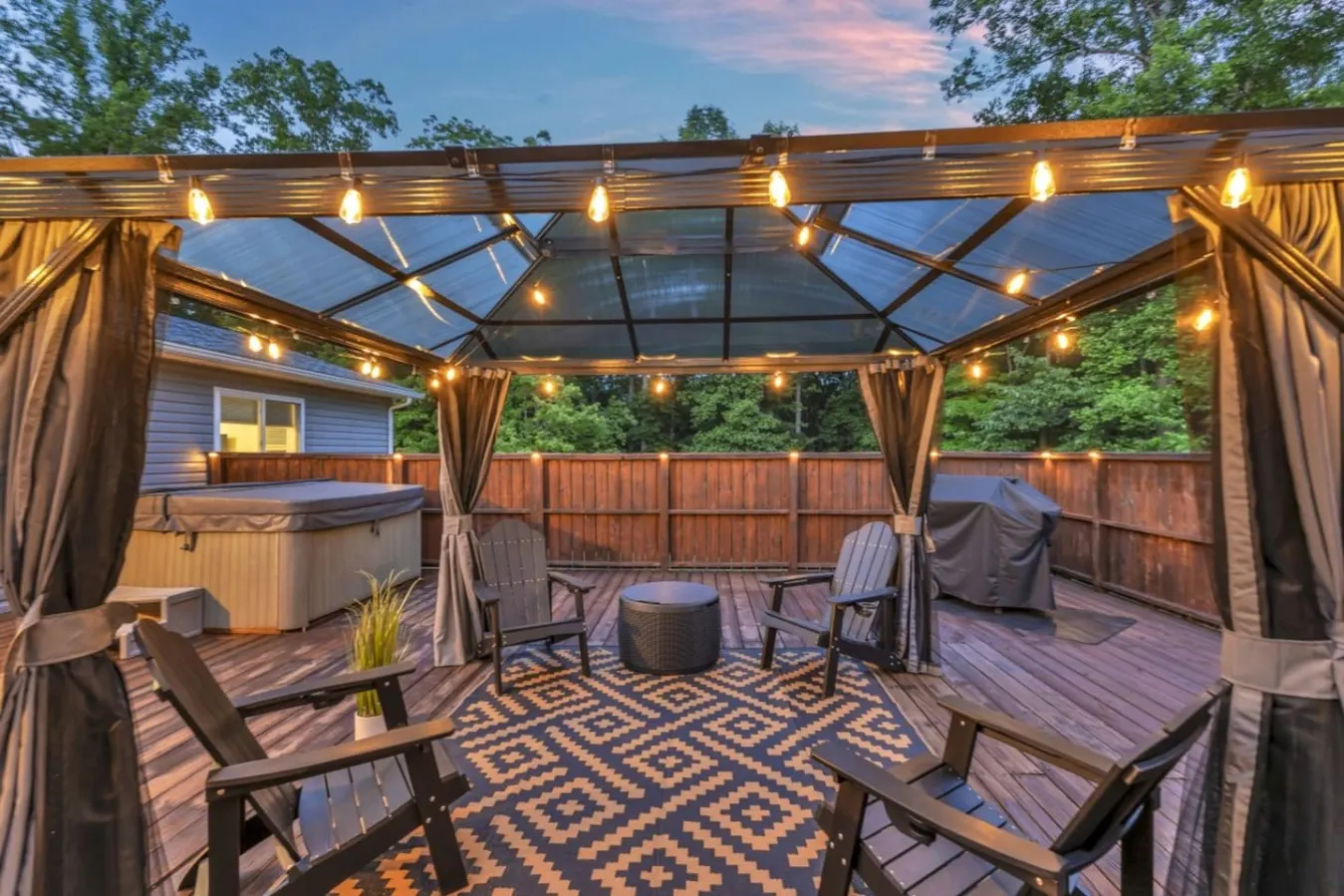 String lights over the deck at twilight.